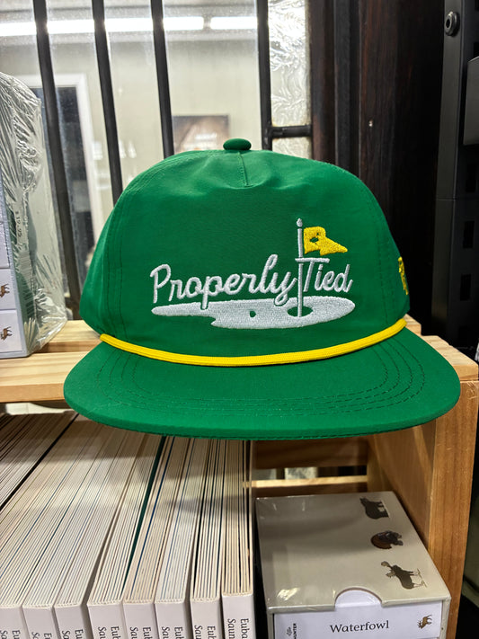 Properly Tied Green Golf Hat